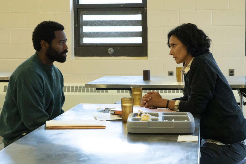 This image released by ABC shows Nicholas Pinnock, left, and Indira Varma in a scene from "For Life," airing Tuesdays at 10 p.m. EST on ABC. (Giovanni Rufino/ABC via AP)