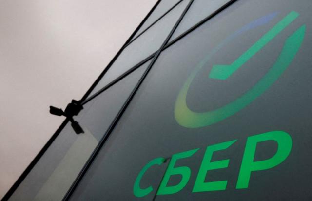FILE PHOTO: The logo is on display in an office of the Russian largest lender Sberbank in Moscow