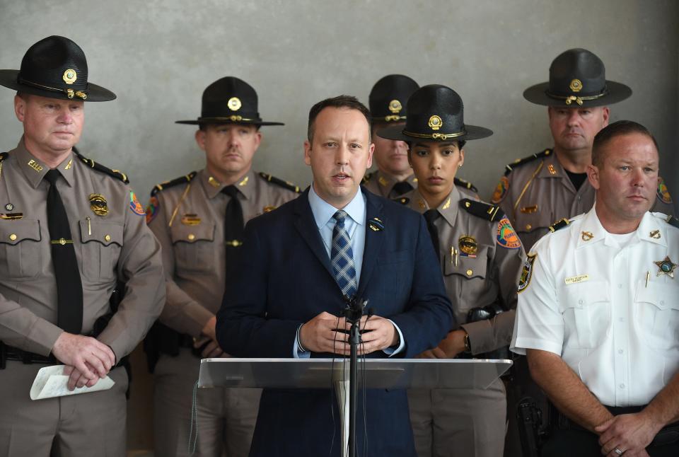 Dave Kerner (center) Director of the Florida Department of Highway Safety and Motor Vehicles talks about the Florida Highway Patrol Trooper Zachary Fink during a press conference at Christ Fellowship Church in Port St. Lucie. on Friday, Feb. 2, 2024. Fink died in a crash on Interstate 95 near mile marker 120 in Port St. Lucie. Fink was in pursuit of a fleeing felon, when the felon made a U-turn and crashed. A semi-truck also was involved in the crash, FHP officials said. The truck driver died at the crash scene.