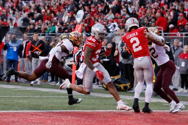 Henderson, McCord combine for 4 TDs as No. 3 Ohio State beats Minnesota  37-3 with Michigan up next