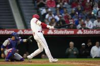Los Angeles Angels' Shohei Ohtani hits a home run against the Chicago Cubs during the fourth inning of a baseball game Tuesday, June 6, 2023, in Anaheim, Calif. (AP Photo/Jae C. Hong)