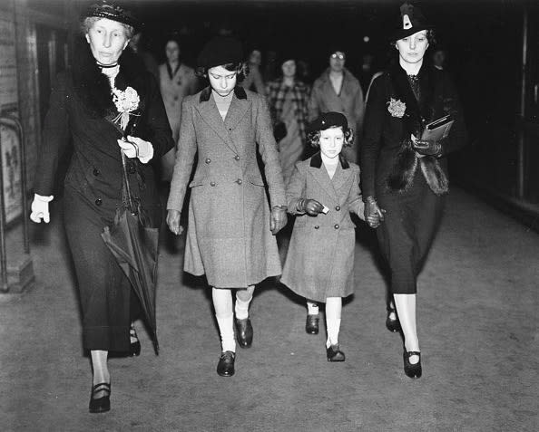 <div class="inline-image__caption"><p>Princesses Elizabeth (second left) and Margaret are accompanied by Lady Helen Graham (left) and governess Marion Kirk Crawford (right) as they arrive for their first ride on a London Underground tube train at St James’s Park, London, May 15, 1939.</p></div> <div class="inline-image__credit">Central Press/Hulton Archive/Getty</div>