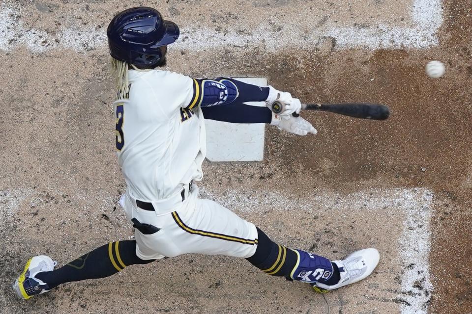 Milwaukee Brewers' Raimel Tapia hits a single during the fifth inning of a baseball game against the Chicago Cubs Thursday, July 6, 2023, in Milwaukee. (AP Photo/Morry Gash)