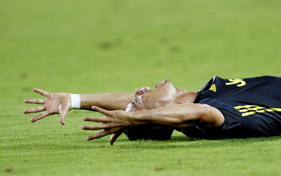 Juventus forward Cristiano Ronaldo reacts after receiving a red card during the Champions League, group H soccer match between Valencia and Juventus, at the Mestalla stadium in Valencia, Spain, Wednesday, Sept. 19, 2018. (AP Photo/Alberto Saiz)