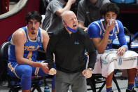 UCLA coach Mick Cronin shouts to the team during the first half of an NCAA college basketball game against Utah on Thursday, Feb. 25, 2021, in Salt Lake City. (AP Photo/Rick Bowmer)