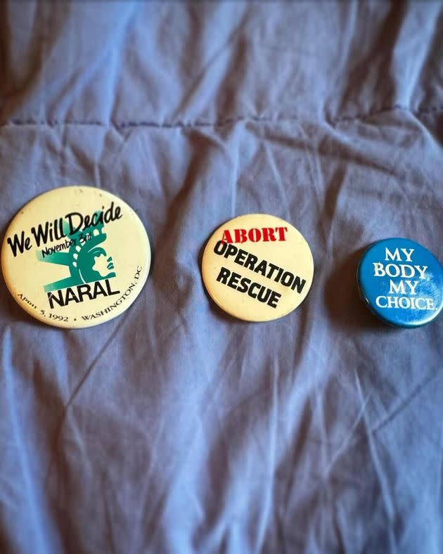 "These are buttons from my time fundraising and advocating for reproductive rights in the 1990s," the author writes. <span class="copyright">Courtesy of Debi Lewis</span>