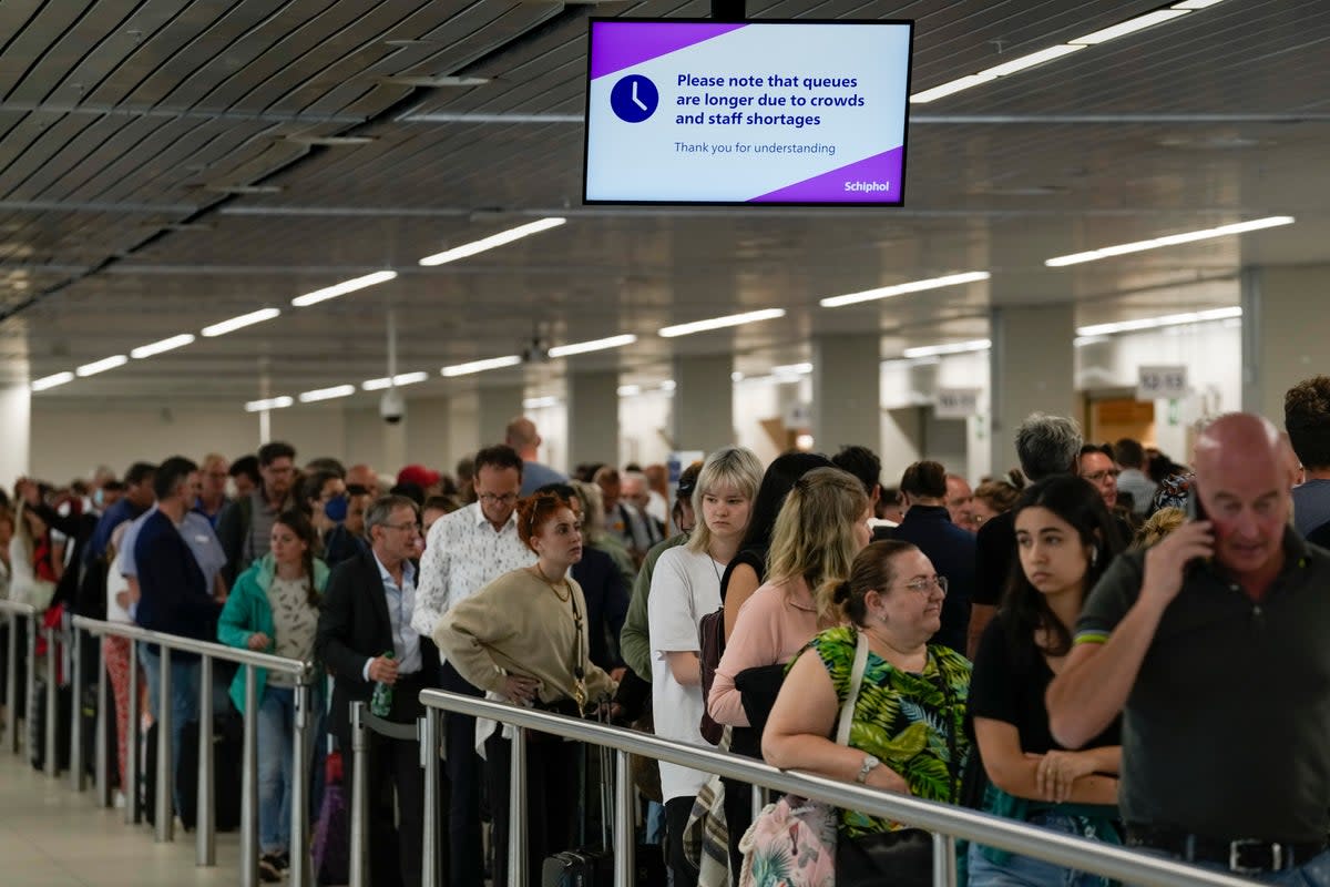 Waiting game: Passenger queuing for formalities at Amsterdam airport  (Copyright 2022 The Associated Press. All rights reserved)