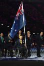 LONDON, ENGLAND - AUGUST 29: Wheelchair rugby player Greg Smith of Australia carries the flag during the Opening Ceremony of the London 2012 Paralympics at the Olympic Stadium on August 29, 2012 in London, England. (Photo by Clive Rose/Getty Images)