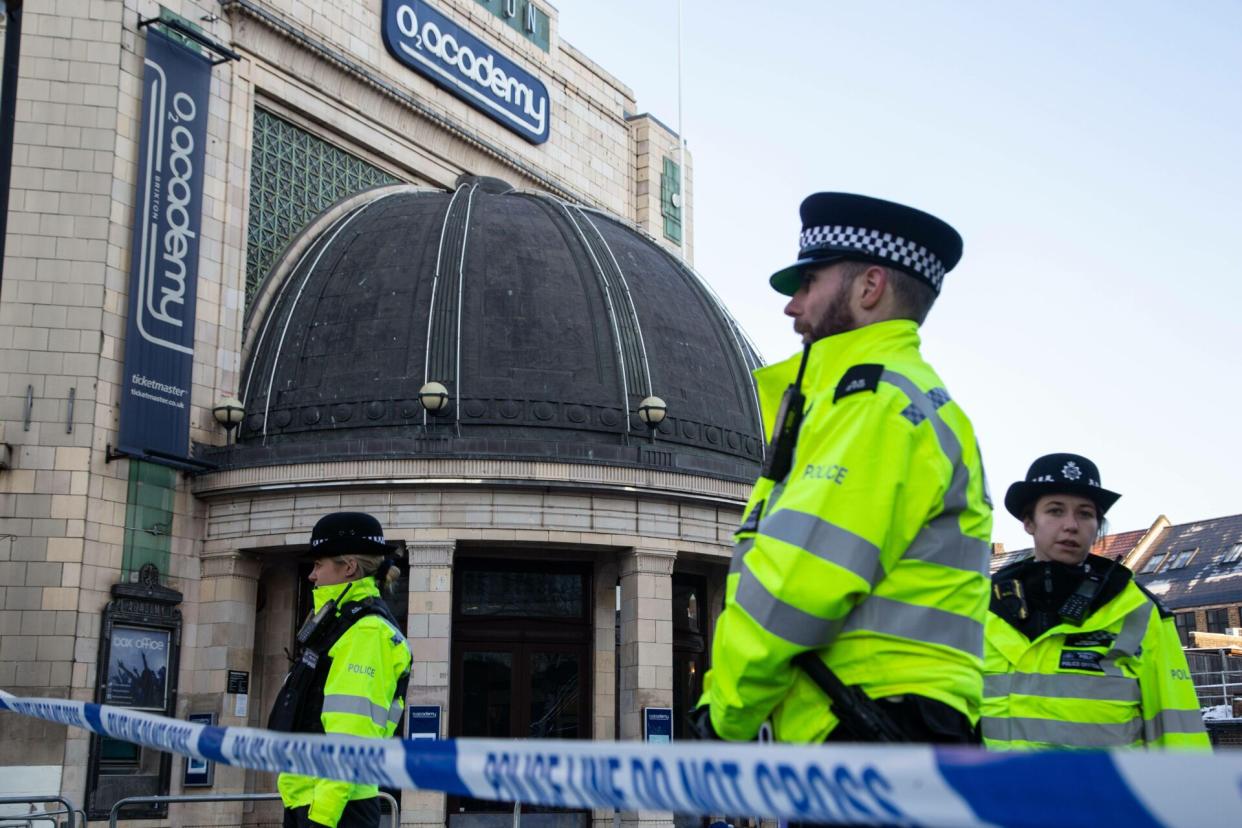 Police forensic investigators seen outside Brixton Academy after a crowd crush during an Asake concert in Brixton. (Photo by Alamy/Thabo Jaiyesimi / SOPA Images/Sipa USA)