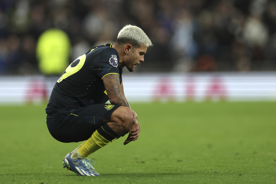 Newcastle's Bruno Guimaraes reacts disappointed after the English Premier League soccer match between Tottenham Hotspur and Newcastle United, at the Tottenham Hotspur Stadium, London, England, Sunday, Dec.10, 2023. (AP Photo/Ian Walton)