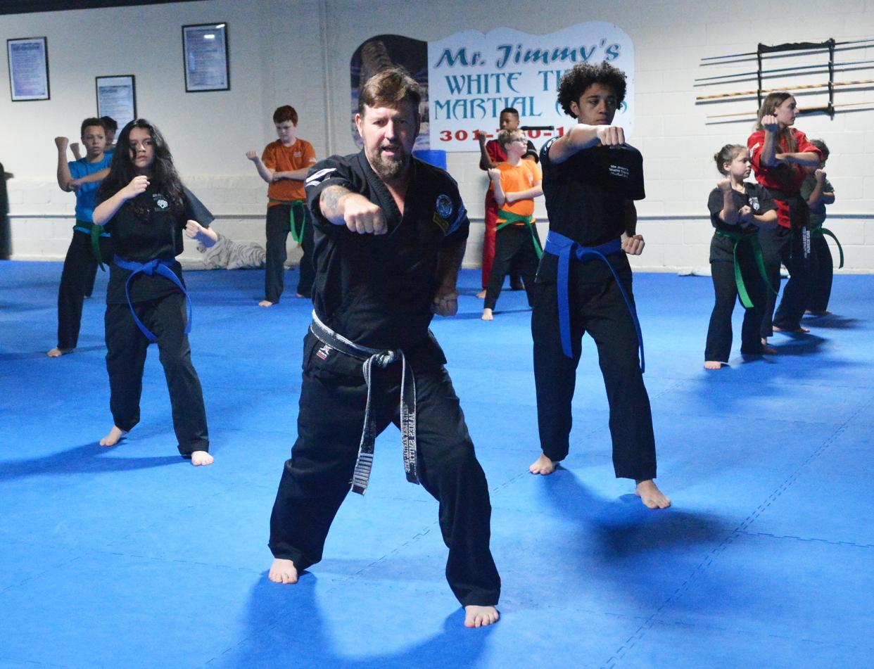 James C. Smith II, a 9th Dan (degree) Black Belt better known as "Mr. Jimmy," leads a class at White Tiger Martial Arts in Hagerstown, which Smith owns.