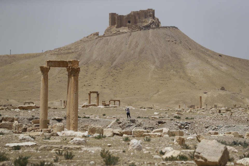 Tourists visit Roman ruins in Palmyra, Syria, Tuesday, May 11, 2023. Palmyra was captured by the Islamic Stae militants in 2015, who blew up some of the most iconic strictures. (AP Photo/Omar Sanadiki)