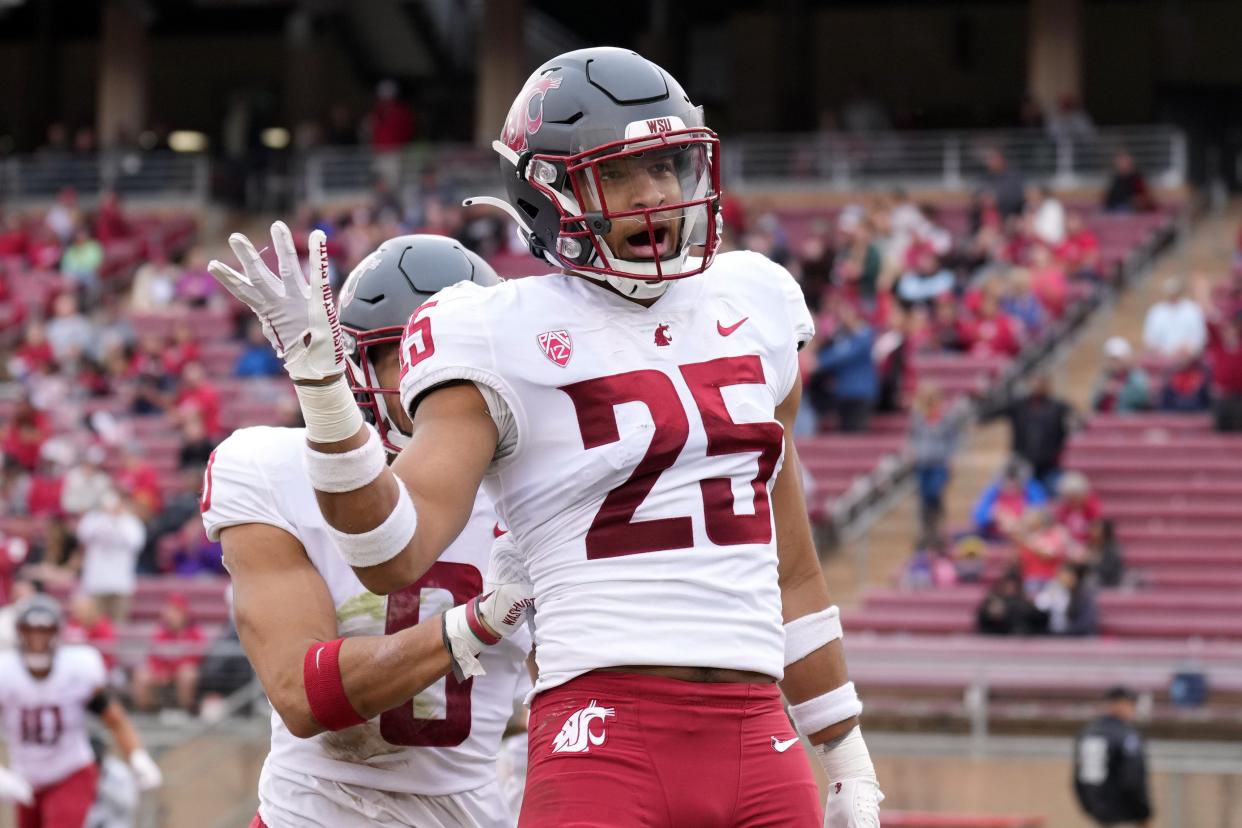 Nov 5, 2022; Stanford, California, USA; Washington State Cougars defensive back Jaden Hicks (25) celebrates after scoring a touchdown against the Stanford Cardinal during the second quarter at Stanford Stadium. Mandatory Credit: Darren Yamashita-USA TODAY Sports