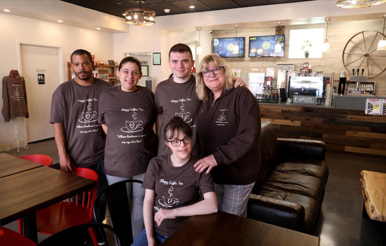 Some of the staff at Sleepy Coffee, Too, in Sleepy Hollow are pictured with owner Kim Kaczmarek, right, at the shop April 23, 2024. They are from left, Sherman Lawrence and Samantha Spatola, assistant managers and Jake Loerker and Ella Manfredi, baristas.