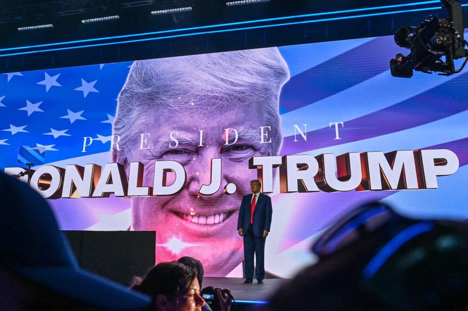 Former US President and 2024 presidential hopeful Donald Trump arrives to speak at the Turning Point Action USA conference in West Palm Beach, Florida, on July 15, 2023.