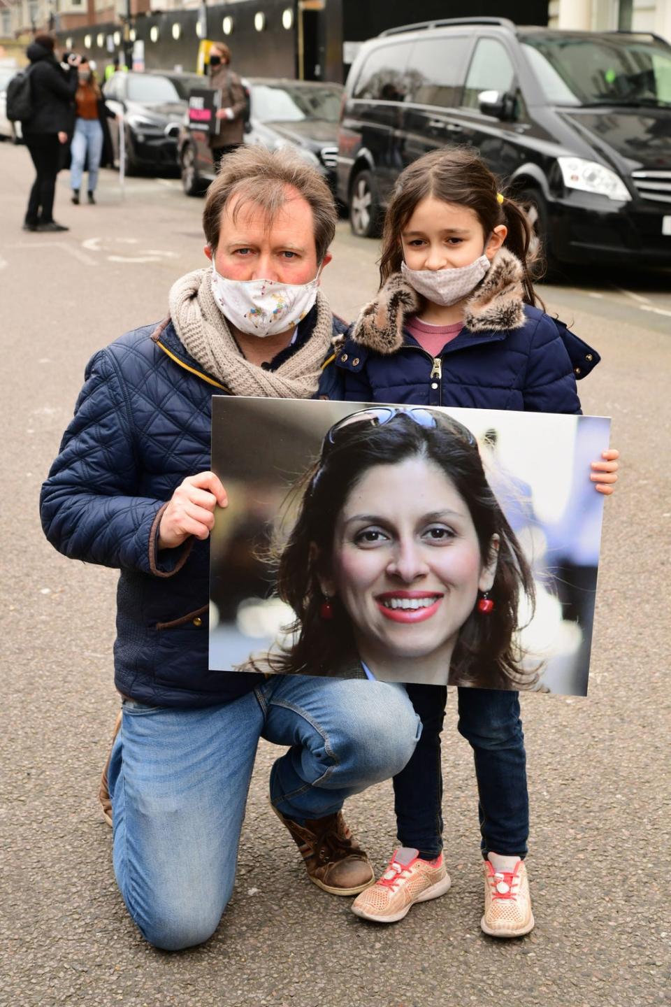 Richard Ratcliffe and his daughter Gabriella outside the Iranian Embassy in London (PA)