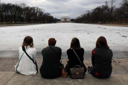 Lincoln Memorial is seen with an icy reflecting pool in Washington, U.S., on the second day of Government shutdown, January 21, 2018. REUTERS/Yuri Gripas