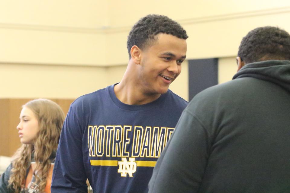 Pope John Paul II QB Kenny Minchey talks with Knights fans prior to his signing day ceremony Wednesday, Dec. 21, 2022 in Hendersonville, Tennessee. Minchey signed to play football at Notre Dame.