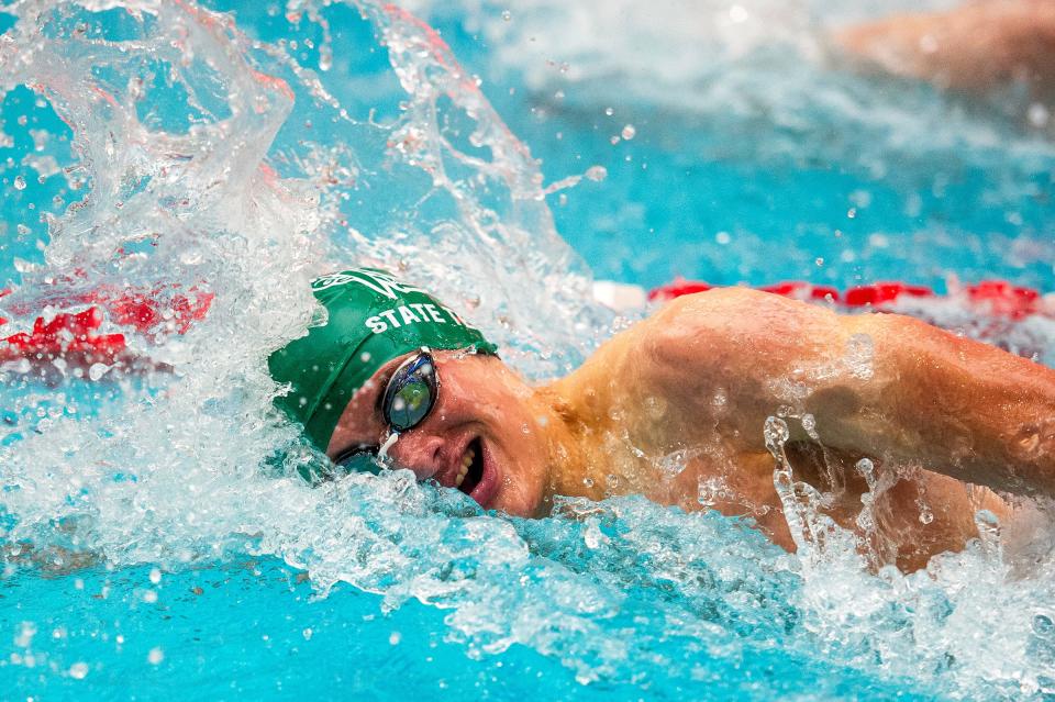 Fossil Ridge's Brennen O'Neil starts his team off in the 400 yard freestyle relay during the Class 5A state swimming championships on May 11 at the Veterans Memorial Aquatics Center in Thornton.