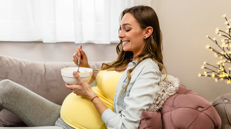 Pregnant woman eating