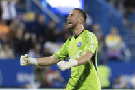 CF Montreal goalkeeper Jonathan Sirois celebrates after his side's fourth goal against Minnesota United during second-half MLS soccer match action in Montreal, Saturday, June 10, 2023. (Evan Buhler/The Canadian Press via AP)