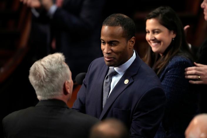 Rep. John James, R-Mich. Shakes hands with Rep. Kevin McCarthy, R-Calif., as he nominates McCarthy for speaker for the seventh round of voting in the House chamber, Thursday, Jan. 5, 2023.