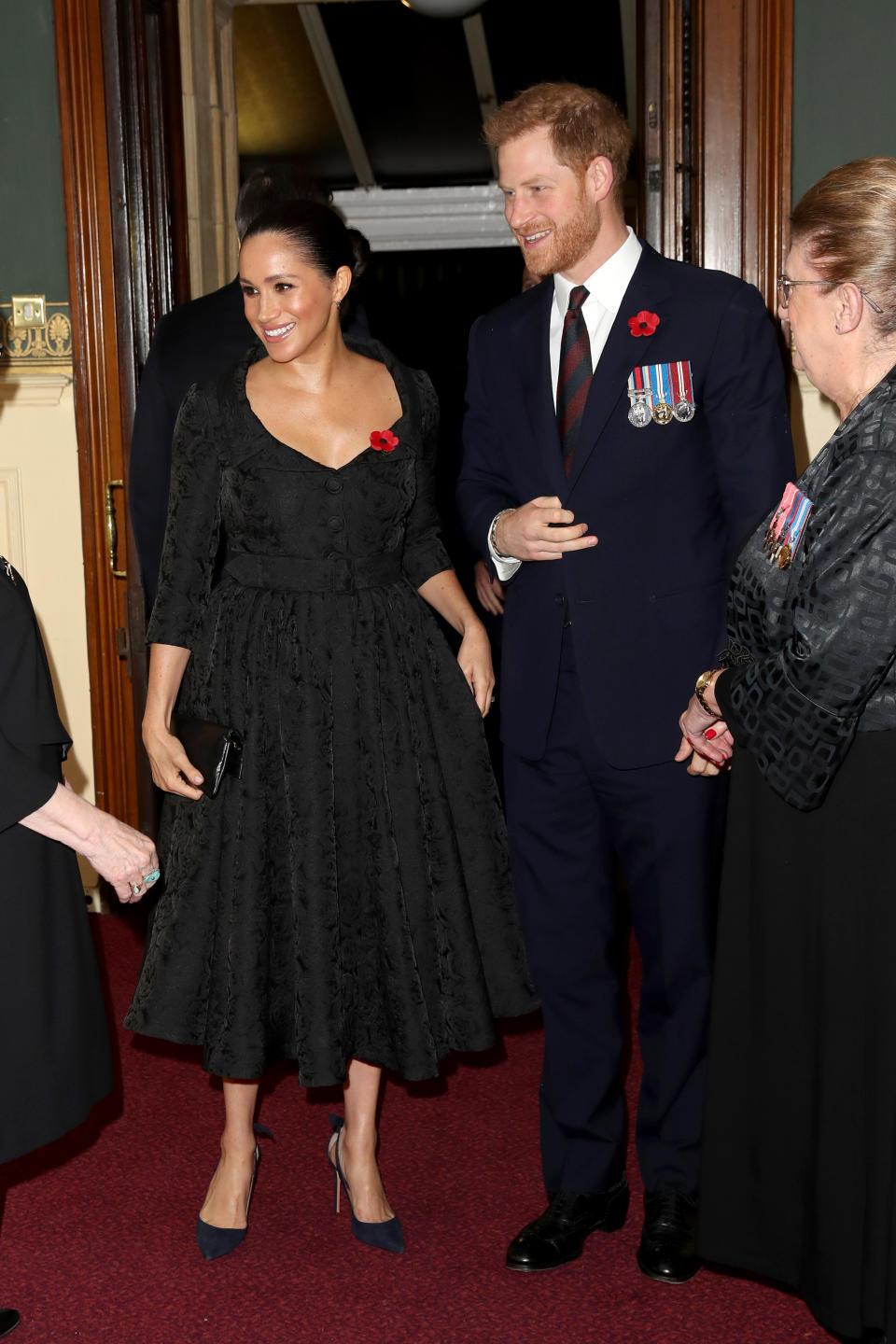Britain's Meghan, Duchess of Sussex (L) and Britain's Prince Harry, Duke of Sussex, (R) attend the annual Royal British Legion Festival of Remembrance at the Royal Albert Hall in London on November 9, 2019. (Photo by Chris Jackson / POOL / AFP) (Photo by CHRIS JACKSON/POOL/AFP via Getty Images)