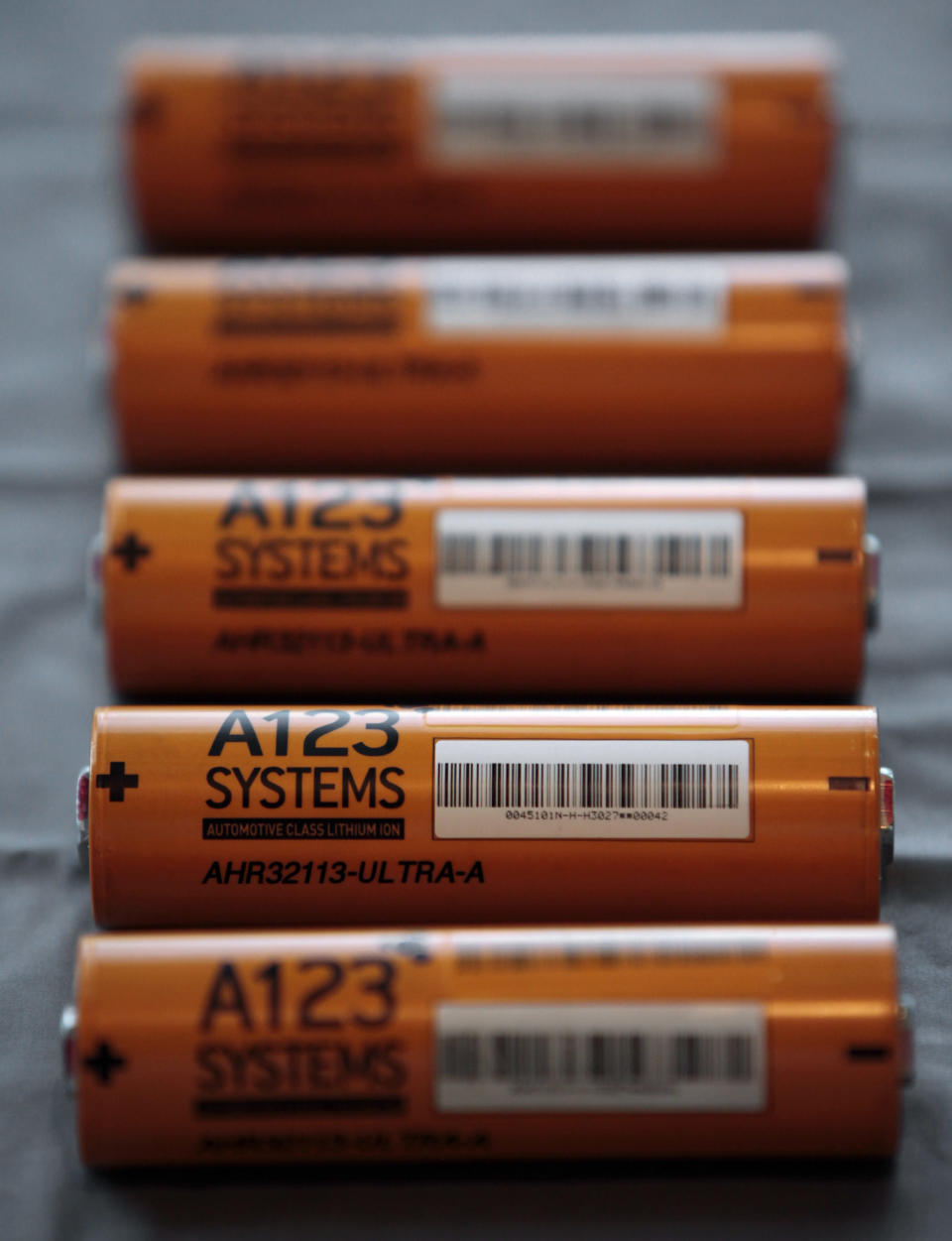 FILE- This Thursday, Aug. 6, 2009, file photo, shows A123 Systems Inc.'s high power Nanophospate Lithium Ion Cell for Hybrid Electric Vehicles batteries in Livonia, Mich. Short of cash and hurting from slow sales of electric cars, battery maker A123 Systems Inc. sent its U.S. operations into bankruptcy protection on Tuesday, Oct. 16, 2012, and quickly sold its automotive assets. The Chapter 11 filing in Delaware came one day after A123 warned that it likely would miss some debt payments and could be headed for court-supervised restructuring. (AP Photo/Paul Sancya, File)