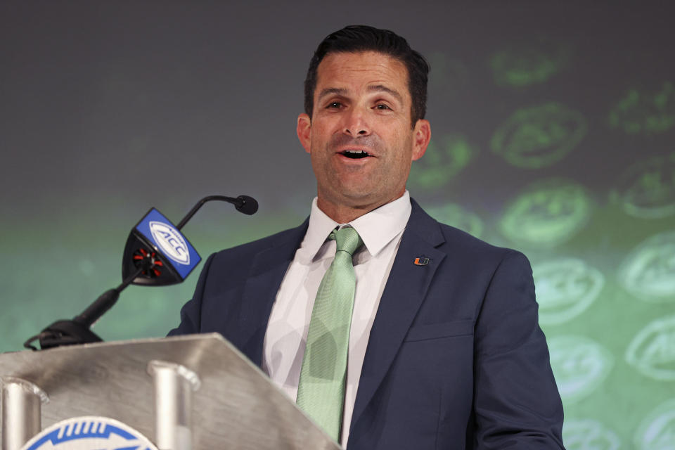 Miami head coach Manny Diaz answers a question during the NCAA college football Atlantic Coast Conference media days in Charlotte, N.C., Wednesday, July 21, 2021. (AP Photo/Nell Redmond)