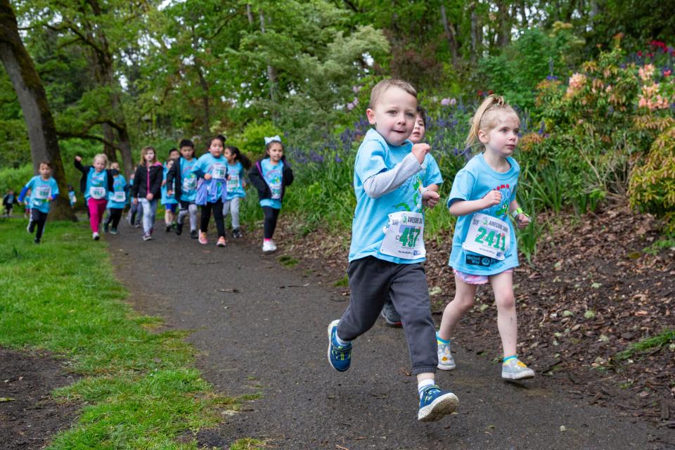 Kindergartners participate in the 2024 Awesome 3000 at Bush's Pasture Park.