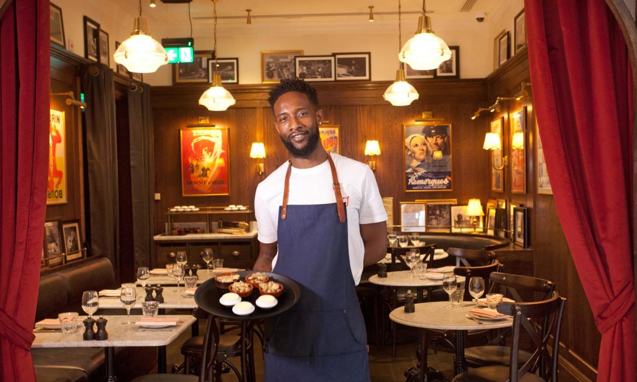 <span>‘This is restaurant as stage set, with enough wood panelling to make buying shares in Pledge seem a smart proposition’: the dining room at Josephine Bouchon.</span><span>Photograph: Sophia Evans/The Observer</span>