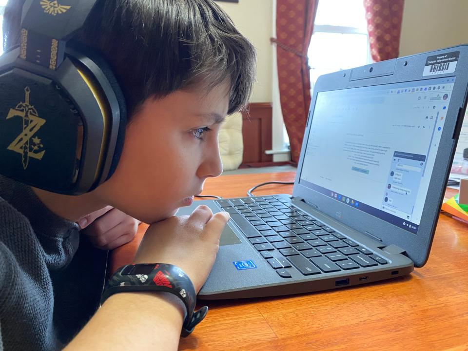 Xander Barton, 9, completes his fourth grade school work from home during remote learning April 27. His school, Williston Central, provided him a Chromebook to use at home while school was closed during the COVID-19 pandemic.