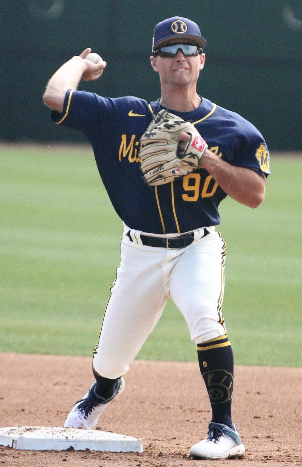 Milwaukee Brewers 2022 second round draft pick Robert Moore turns a double play during minor league workouts at American Family Fields of Phoenix on March 6, 2023.