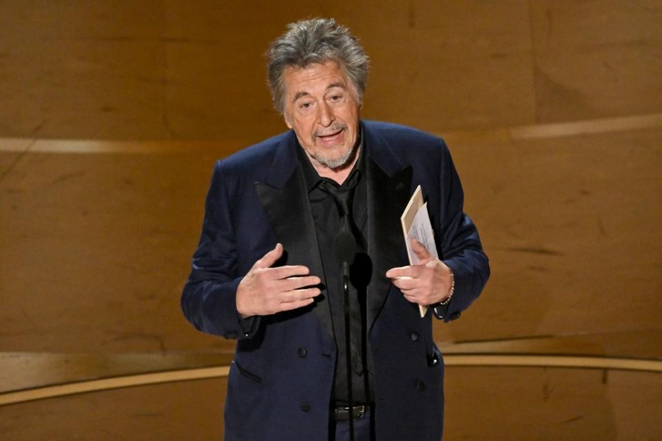 “This is the time for the last award of the evening, and it’s my honor to present it. Ten wonderful films were nominated, but only one will take the award for Best Picture,” Pacino stated while fumbling to open the envelope. “And, uh, I have to go to the envelope for that, and I will. Here it comes. And my eyes see ‘Oppenheimer.’ Yes. Yes.” Rob Latour/Shutterstock