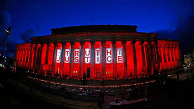 St George’s Hall in Liverpool is illuminated following a special commemorative service to mark the outcome of the Hillsborough inquest, which ruled that 96 Liverpool fans who died as a result of the Hillsborough disaster were unlawfully killed 