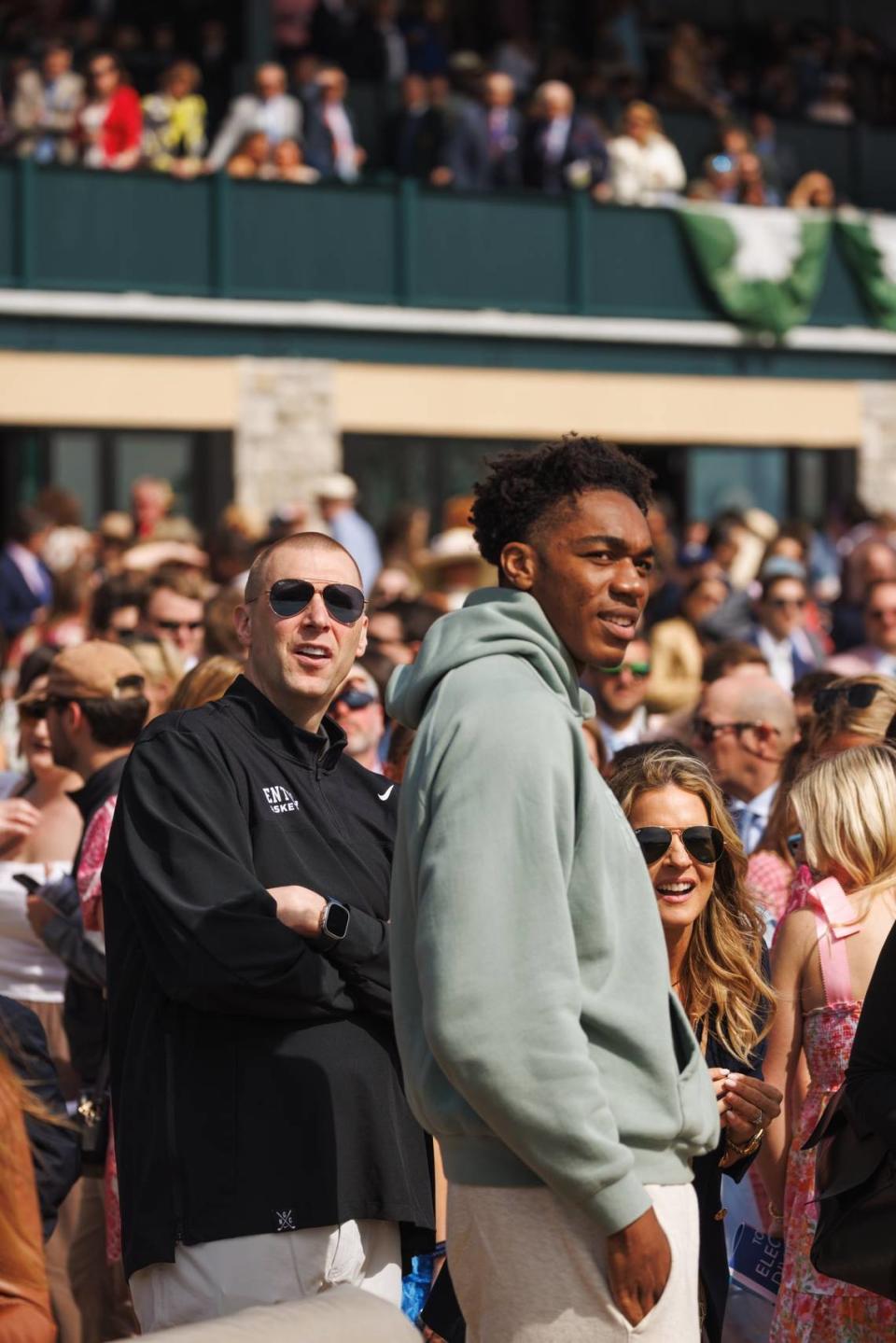 Kentucky men’s basketball head coach Mark Pope, left, watches a horse race at Keeneland with college basketball player Amari Williams. Formerly a four-year player at Drexel, Williams will transfer to UK for the 2024-25 season. Keeneland