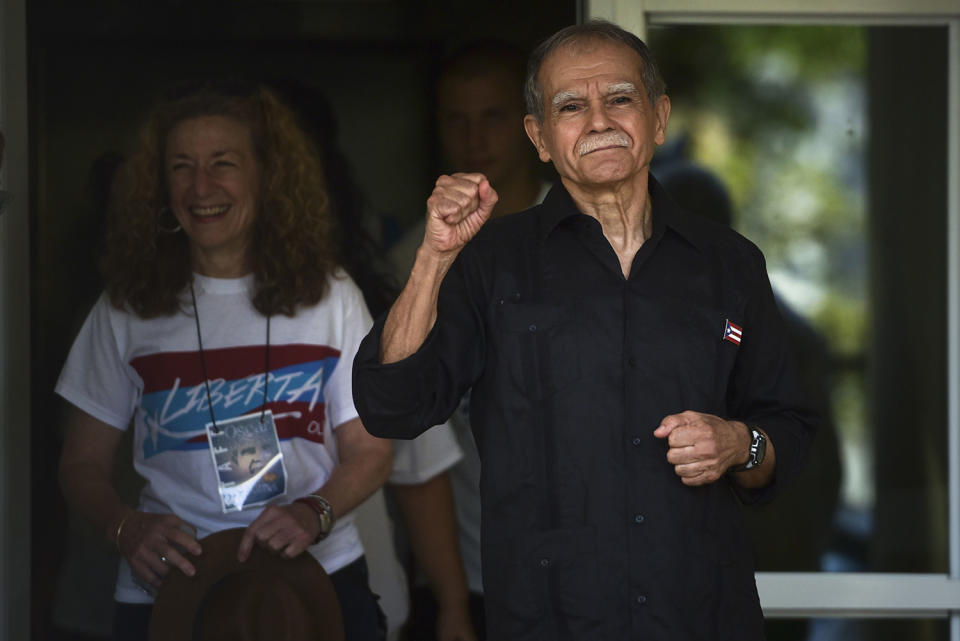 <p>Puerto Rican nationalist Oscar Lopez Rivera gestures as he is released from home confinement after 36 years in federal custody, in San Juan, Puerto Rico, Wednesday, May 17, 2017. Lopez was considered a top leader of Puerto Rican militant group that said it was responsible for more than 100 bombings in several U.S. cities and Puerto Rico during the 1970s and early 1980s. (Photo: Carlos Giusti/AP) </p>