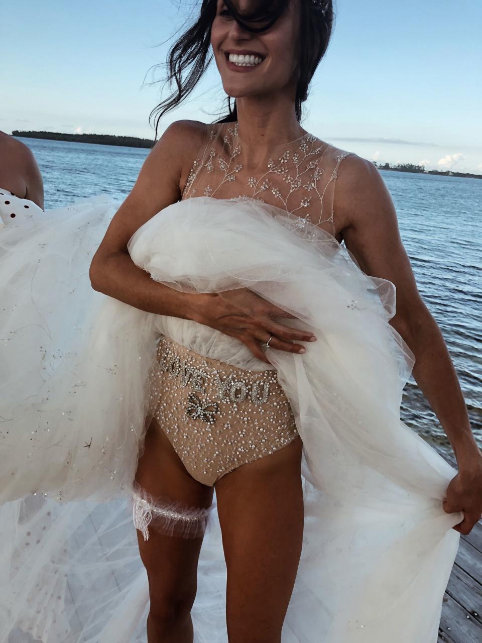 Sharing the LOVE! Obsessed with my Reem Acra wedding dress. She was a dream to work with and literally made me in a dress. I also love my Dannijo customized Agent Provocateur garter underneath—I added tons of pearls!!