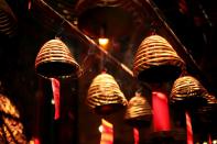 Incense is seen burning inside the Man Mo Temple.