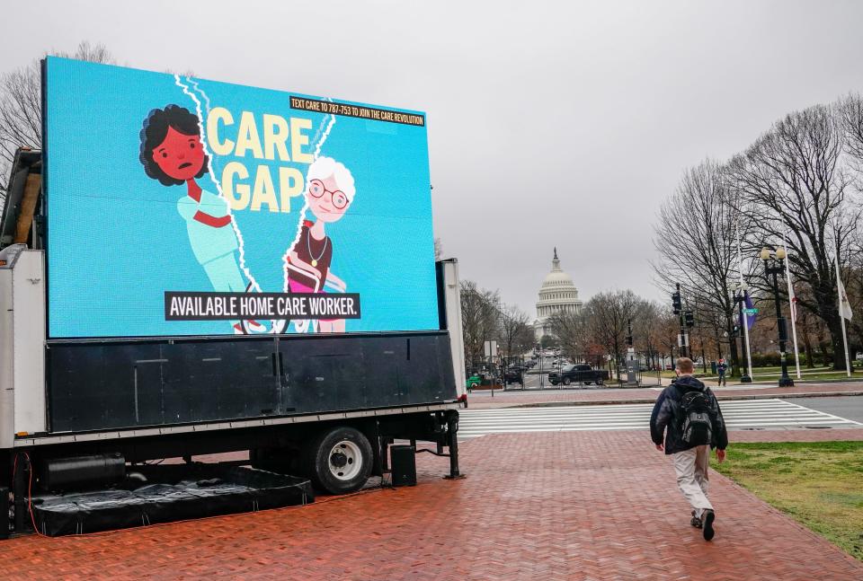 The National Domestic Workers Alliance and the Service Employees International Union call for Congress to invest in caregiving jobs on March 25, 2021.