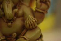 Ganesha with Modak. <br>By <a href="http://www.flickr.com/photos/naveen_kumar_reddy/" rel="nofollow noopener" target="_blank" data-ylk="slk:Ganugapenta NaveenKumar Reddy;elm:context_link;itc:0;sec:content-canvas" class="link ">Ganugapenta NaveenKumar Reddy</a>