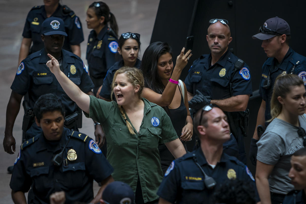 WASHINGTON DC, WASHIGNTONN DC, DISTRICT OF COLUMBIA, UNITED STATES - 2018/10/04: Amy Schumer is arrested when thousands of protesters flooded Washington DC to protest the nomination of Judge Brett Kavanaugh to the Supreme Court of the United States. Kavanaugh has been accused of sexual assault. Over 600 people were arrested in the Hart Senate office buildings. (Photo by Michael Nigro). (Photo by Michael Nigro/Pacific Press/LightRocket via Getty Images)