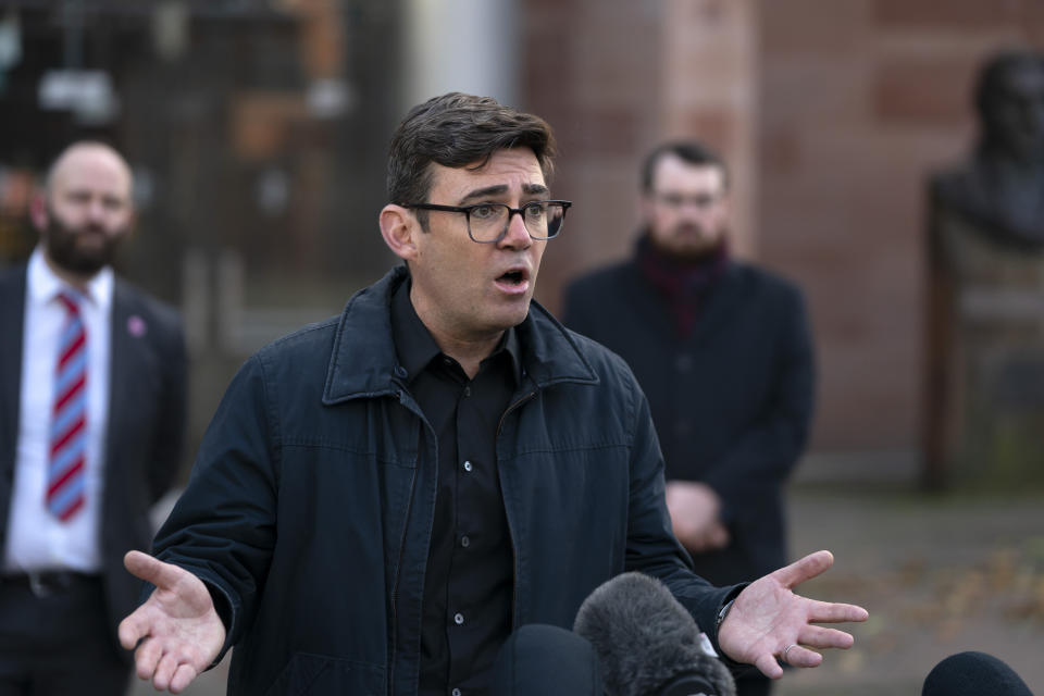 Greater Manchester mayor Andy Burnham speaks to the media outside Bridgewater Hall, following last-ditch talks with the Prime Minister aimed at securing additional financial support for his consent on new coronavirus restrictions, in Manchester, England, Tuesday, Oct. 20, 2020. The British government appeared poised Tuesday to impose strict coronavirus restrictions on England's second-largest city after talks with officials in Greater Manchester failed to reach an agreement on financial support for people whose livelihoods will be hit by the new measures (AP Photo/Jon Super)