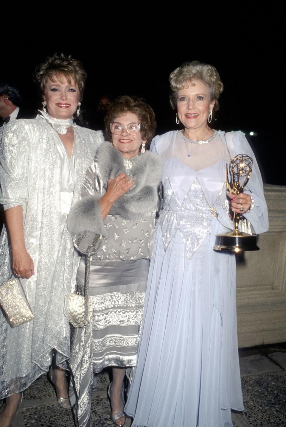 <p>Betty poses with her Golden Girl co-stars Rue McClanahan and Estelle Getty at the 38th Annual Primetime Emmy Awards. She won an Emmy for her role as the naive-but-sweet Rose. </p>