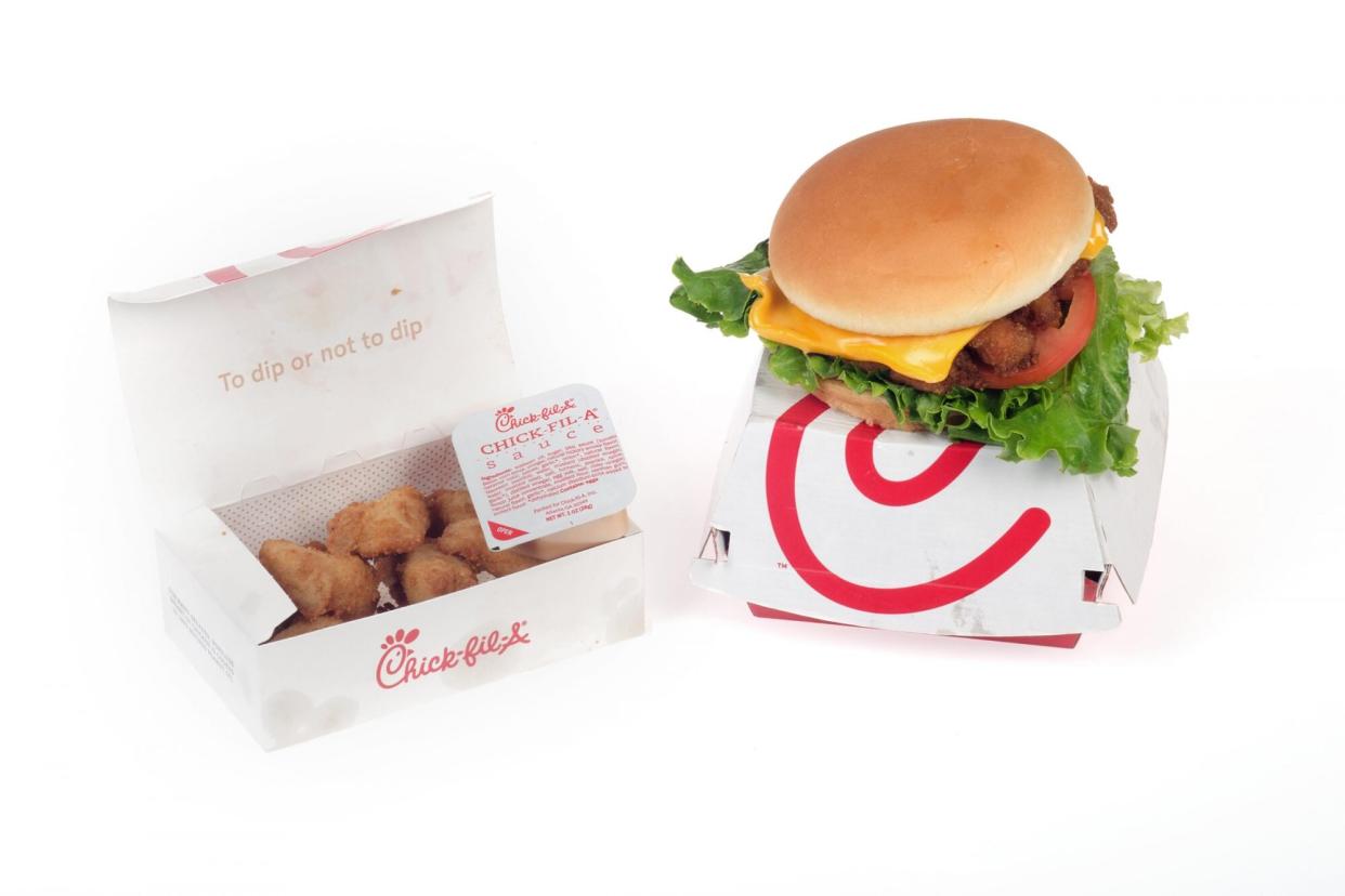 Chick-Fil-A Deluxe Chicken sandwich with dipping sauce