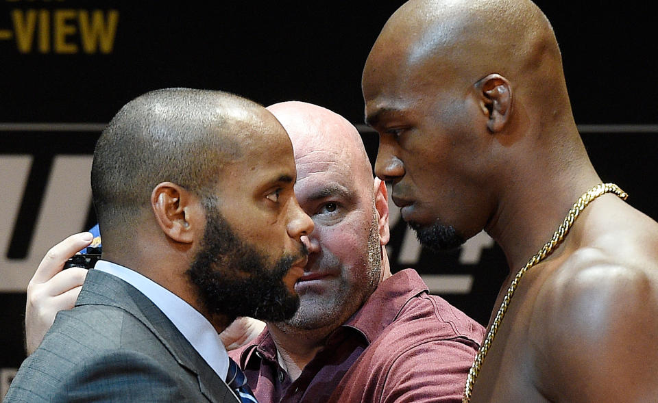 Daniel Cormier (L) hasn’t been able to beat his nemesis, Jon Jones, in their two fights against one another. (Getty)