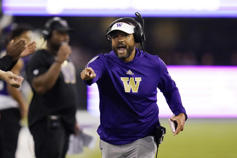 Washington head coach Jimmy Lake yells toward the field in the first half of an NCAA college football game against California, Saturday, Sept. 25, 2021, in Seattle. (AP Photo/Elaine Thompson)