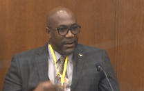 In this image from video, Philonise Floyd, brother of George Floyd, testifies as Hennepin County Judge Peter Cahill presides over court Monday, April 12, 2021, in the trial of former Minneapolis police Officer Derek Chauvin, in the May 25, 2020, death of George Floyd at the Hennepin County Courthouse in Minneapolis, Minn. (Court TV via AP, Pool)