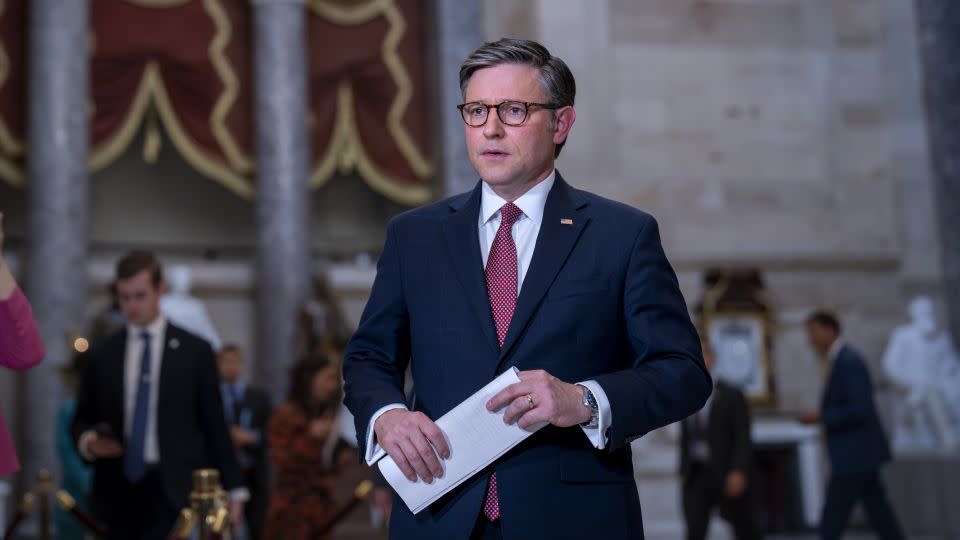 House Speaker Mike Johnson arrives to speak with reporters to discuss his proposal of sending aid to Ukraine, Israel and Taiwan on April 17, 2024. - J. Scott Applewhite/AP