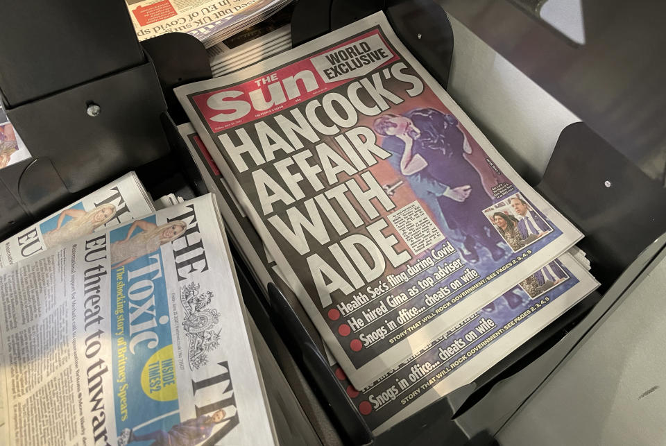 LONDON, ENGLAND - JUNE 25:  A view of copies of the Sun newspaper on a newsstand on June 25, 2021 in London, England. The paper has run an exclusive that suggests the Health Secretary Matt Hancock had an affair with his adviser Gina Coladangelo, and broke Covid-19 social distancing rules. The Prime Minister has reportedly accepted an apology after the The Health Secretary admitted breaking social distancing guidance and considers the matter closed.  (Photo by Dan Kitwood/Getty Images)